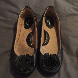Woman’s black leather b.o.c flats